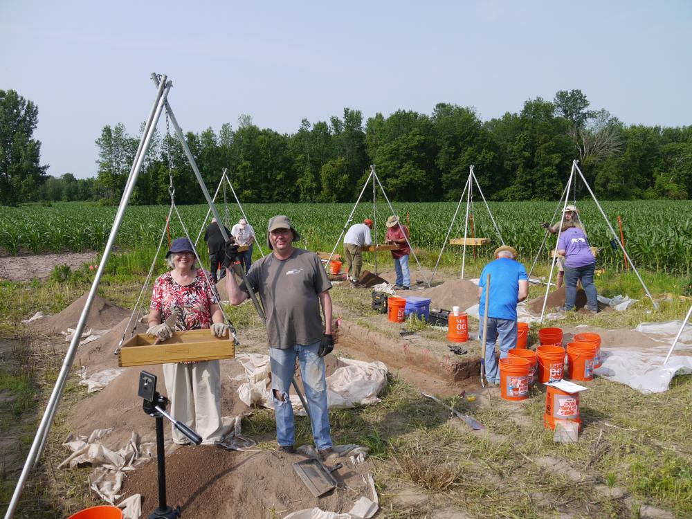 Volunteers Sue S. and Neil W. pause during block excavations at the OPS Site, July 10, 2019