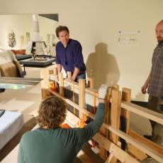 people designing exhibit